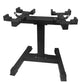 Black metal dumbbell stand with adjustable arm clamps and wide base, on white background