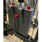 Warrior 3.0 cable crossover pulley power rack with black weight plates, red handles, and dual adjustable pulleys with lat pul