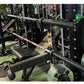 Warrior 6-bearing barbell with camo Cerakote finish and black knurled sleeves, displayed on gym equipment rack