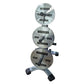 Warrior chrome Olympic weight plates stacked vertically on rack showing 25lb, 35lb, and 45lb plates with black handles on whi