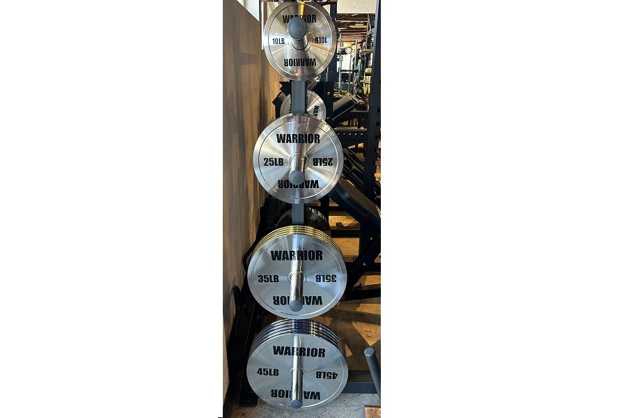 Warrior Chrome Olympic weight plates stacked vertically showing 25lb, 35lb, and 45lb plates with black text and chrome finish