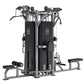 Black and silver commercial multi-station gym equipment with four stacked workout stations, dual cable towers, and adjustable