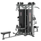 Warrior Deluxe Commercial Series 4-stack multi-station gym with black padding, gray metal frame, weight stacks, and bench att