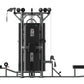 Black multi-station gym equipment with gray metal frame, featuring central chest press, side leg extension, cable machine, an