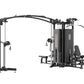 Multi-station gym equipment with black metal frame, gray padding, cable machines, and leg press attachment on white backgroun