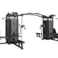 Black multi-station home gym with eight weight stacks, cable machines, and leg press attachment on white background