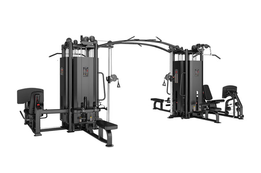 Black multi-station home gym with eight weight stacks, cable machines, and leg press attachment on white background