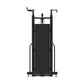 Black commercial crossover cable machine with dual adjustable arms and padded seat on white background