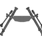 Black dual-arm functional trainer with extending poles, metal connectors, and foot pads on white background