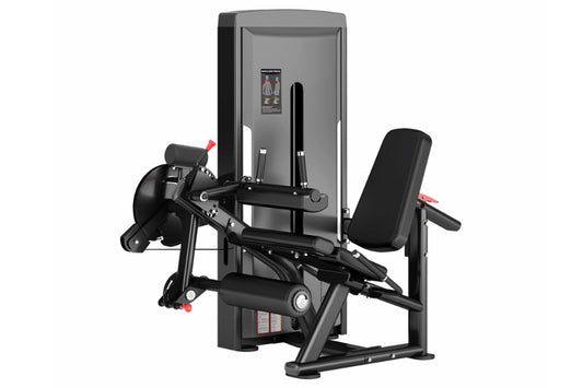 Commercial leg curl and extension machine with black frame, gray padded seat, adjustable leg pad, and digital display console