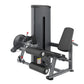 Black commercial leg curl and extension machine with padded seat and backrest on white background
