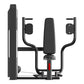 Black commercial pectoral fly machine with padded armrests, curved handles, and red accents on white background