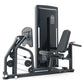 Black commercial leg press machine with digital display, padded seat and backrest, weight stack, and dual handles on white ba