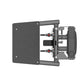 Black and gray standing multi-flight exercise machine with dual handles, footplate, and textured side panel on white backgrou