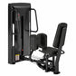 Black commercial leg abduction machine with padded seat and backrest, metal frame, and footplate on white background
