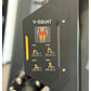 Black V-Squat machine instruction plate showing muscle target areas and exercise form with orange and red anatomical illustra