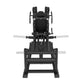 Black commercial V-squat machine with padded backrest, dual handles, and barbell sleeves, front view on white background