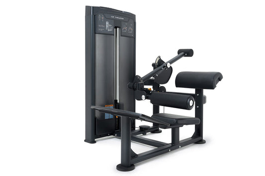 Black commercial hip thruster machine with padded seat, leg extension attachment, and instruction panel on tall frame, on whi