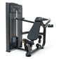 Warrior Elite Commercial Series iso-lateral shoulder press machine with dark gray frame, padded seat, and dual handles on whi