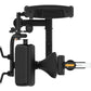 Black seated arm curl and extension machine with padded seat, adjustable arm supports, and gold accents on white background