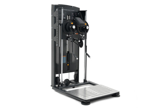 Black and gray commercial standing flight trainer with dual control wheels, digital display, and metal footplate on white bac