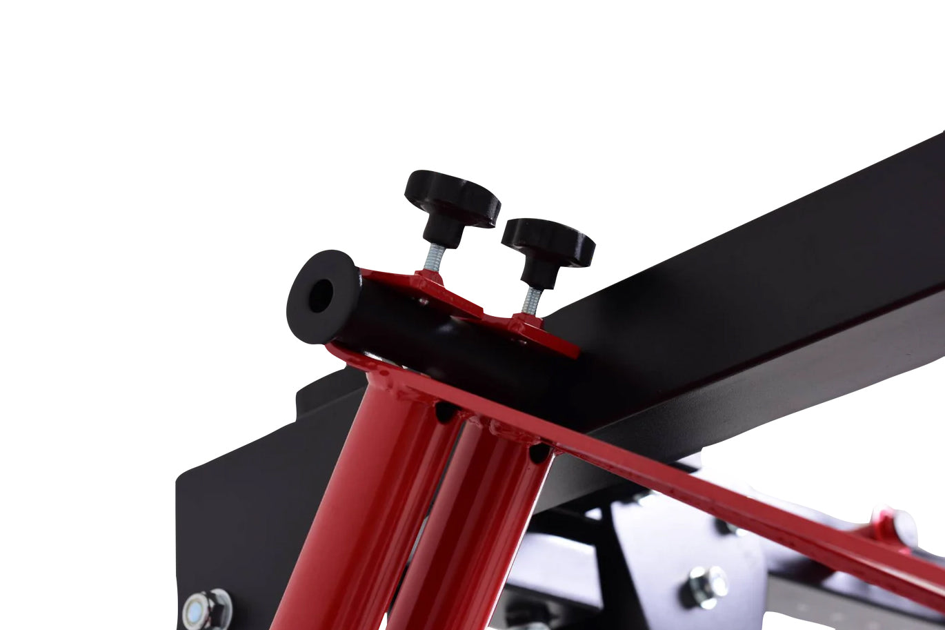 Red and black cable pulley power rack with adjustable pull-down attachment and thumb screws, mounted on white background