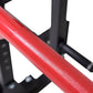 Red and black cable pulley power rack frame with textured red tube and black metal supports on white background