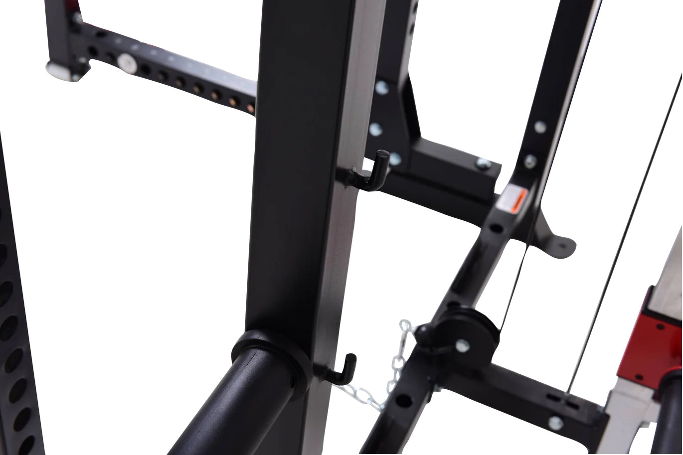 Black metal cable pulley power rack with adjustable arms and chain attachments on white background