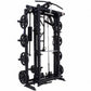 Black freestanding cable pulley power rack with weight plate storage pegs, silver safety bars, and chain attachments on white
