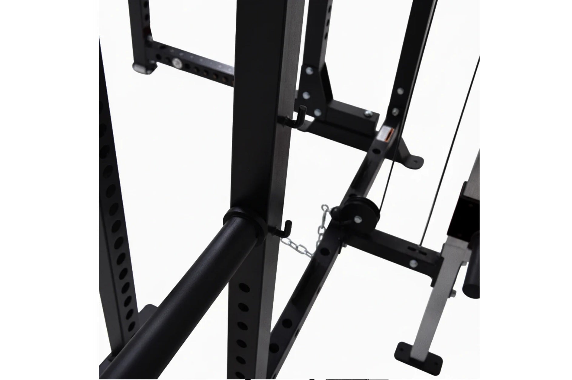 Black steel power rack with cable pulley system, adjustable safety bars, and folding design on white background
