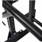 Black steel cable pulley power rack with textured grip handles and vertical support frame on white background