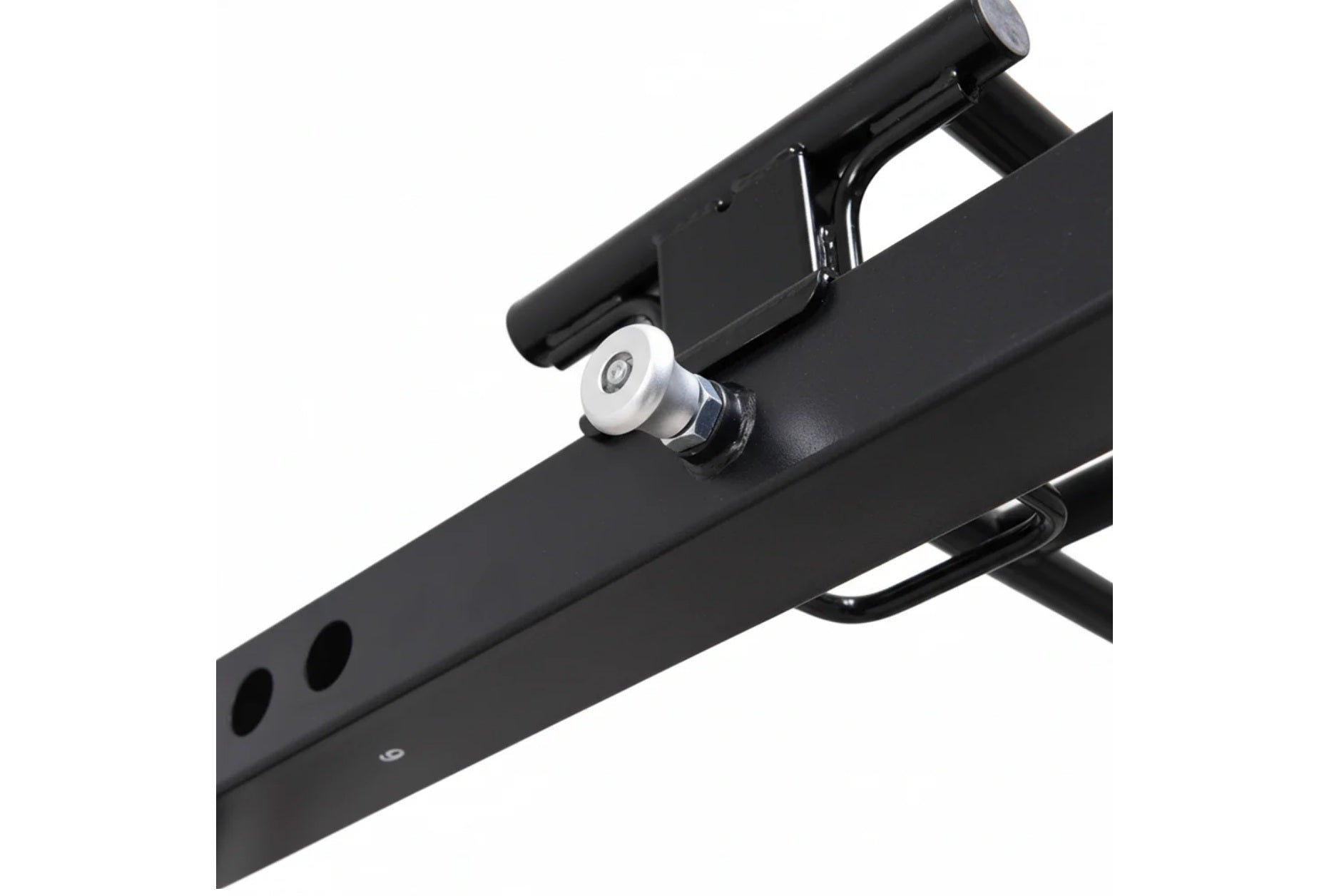Black freestanding cable pulley power rack with white and chrome pulley attachment, shown at angle on white background