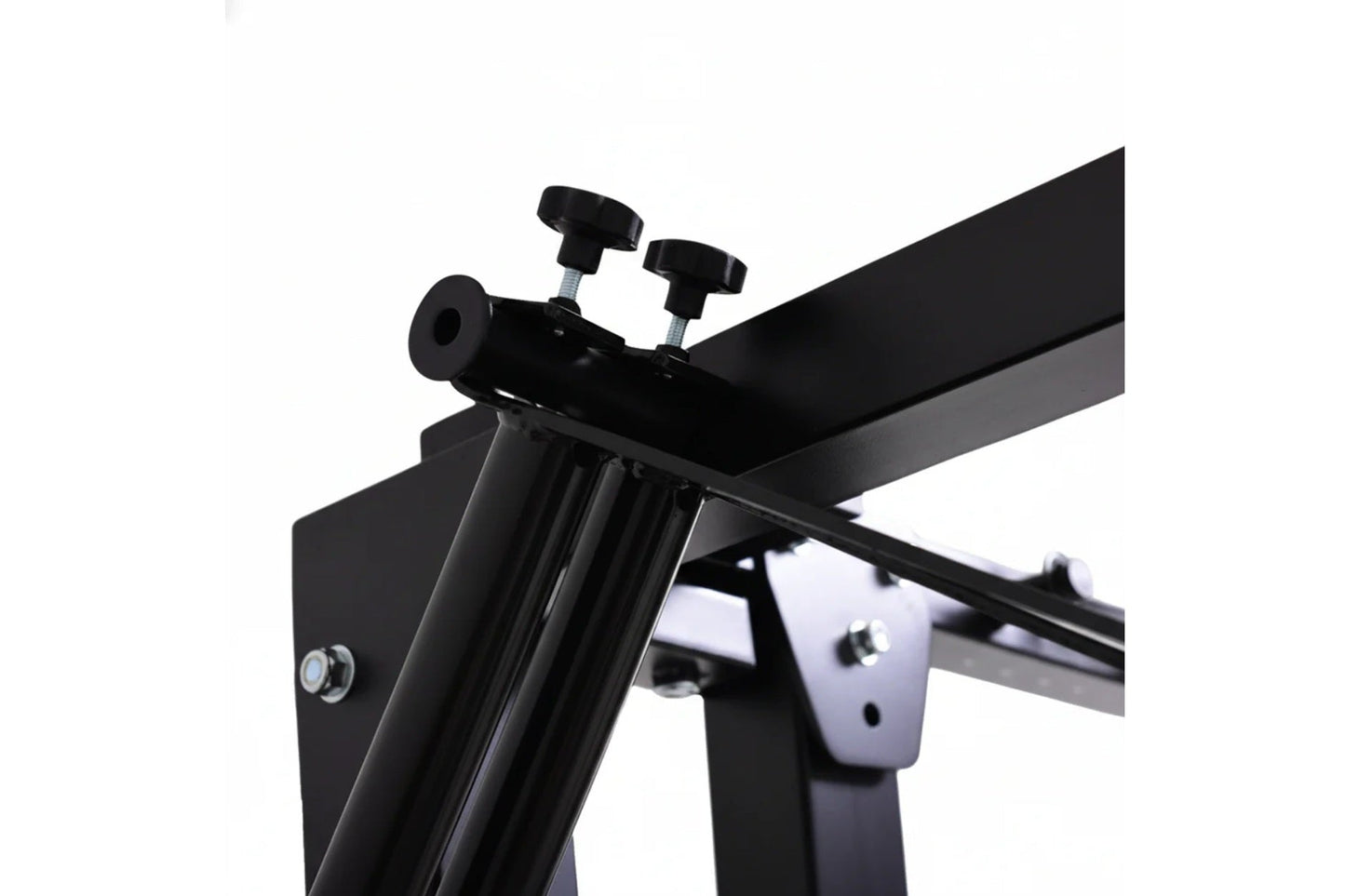 Black and white metal power rack with folding cable pulley system, adjustable height arms, and mounting hardware on white bac