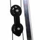 Black double pulley system with cables attached to gray metal frame on white background