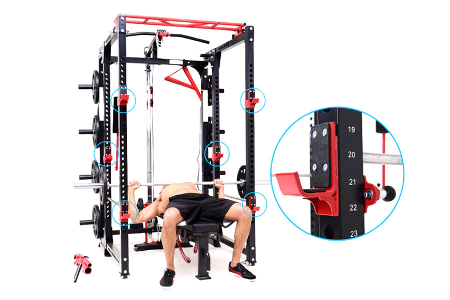 Black and red multi-function power rack with cable pulleys, shown with male model performing chest press exercise and detail 