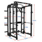 Black metal freestanding power rack with cable pulley system, adjustable pull-up bars, and weight plate pegs, shown with dime