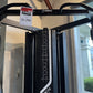 Black Warrior FT900 cable pulley functional trainer with dual weight stacks and adjustable arms, displayed in showroom with s