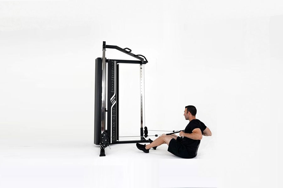 Man using black and silver cable pulley functional trainer machine with dual adjustable pulleys on white background