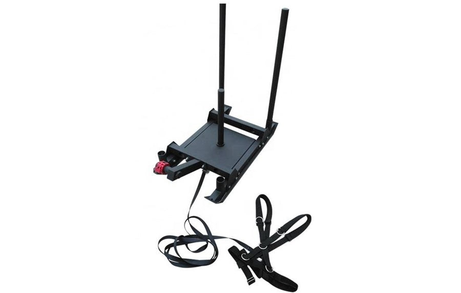 Black metal push sled with dual handles, flat platform base, two vertical antenna rods, attached black cable with connector, 
