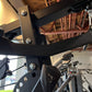 Warrior HG900 home gym with black metal frame, leg press attachment, and cable pulleys on display