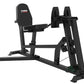 Black Warrior HG900 home gym with padded seat and backrest, leg press attachment, and sturdy steel frame on white background