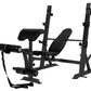 Black multi-function Olympic weight bench with adjustable backrest, leg extension attachment, and safety racks on white backg