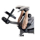Man performing leg press exercise on black and gray multi-function weight bench with adjustable footrest and handles
