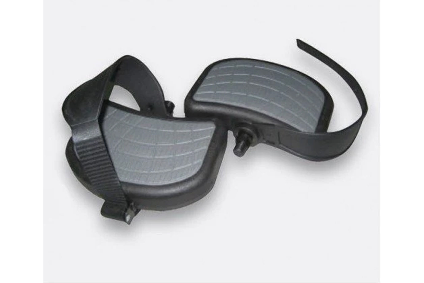 Black oversized platform pedals with gray textured surfaces and adjustable straps on white background