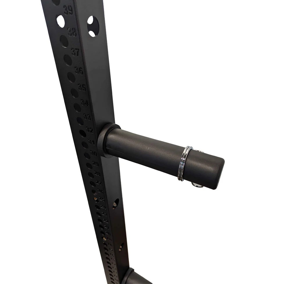 Black power rack with adjustable numbered holes and black cylindrical pull-up bar attachment on white background