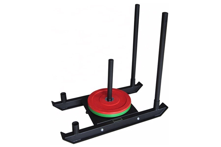 Warrior Pro Push/Pull Weight Sled with red and green circular weight plate, black frame, and four adjustable antenna-style ha