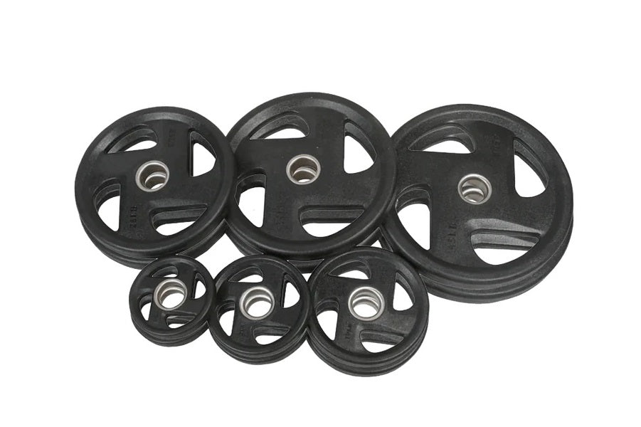 Set of six black rubber grip Olympic weight plates with varying sizes on white background, flat lay view