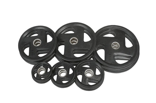 Set of black rubber grip Olympic weight plates in various sizes arranged on white background