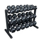 Black rubber hexagonal dumbbell set with multiple weights displayed on tiered black metal rack
