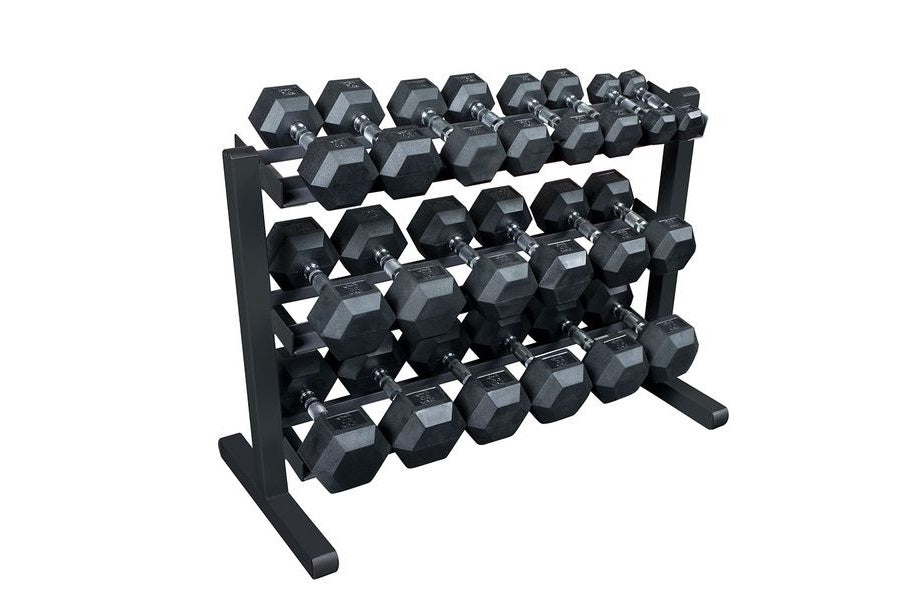 Black rubber hexagonal dumbbell set with multiple weights displayed on tiered black metal rack